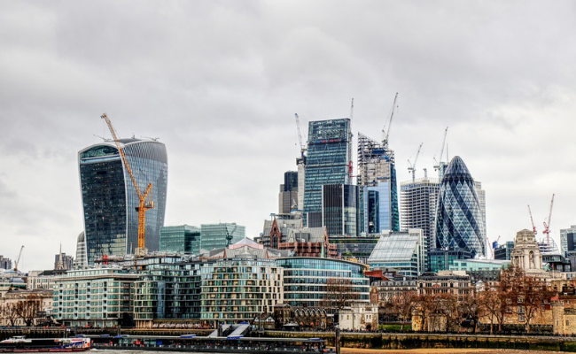 Across the river photo of the City of London skyscrapers including the Gerkin and Walkie Talkie Propman RICS